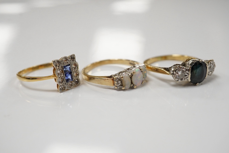 A 10k and three stone opal ring, with diamond set shoulders, an 18ct, sapphire and diamond three stone ring and a 1920's 18ct and plat. sapphire and diamond tablet ring, size P/Q, gross weight 8.1 grams Condition - poor